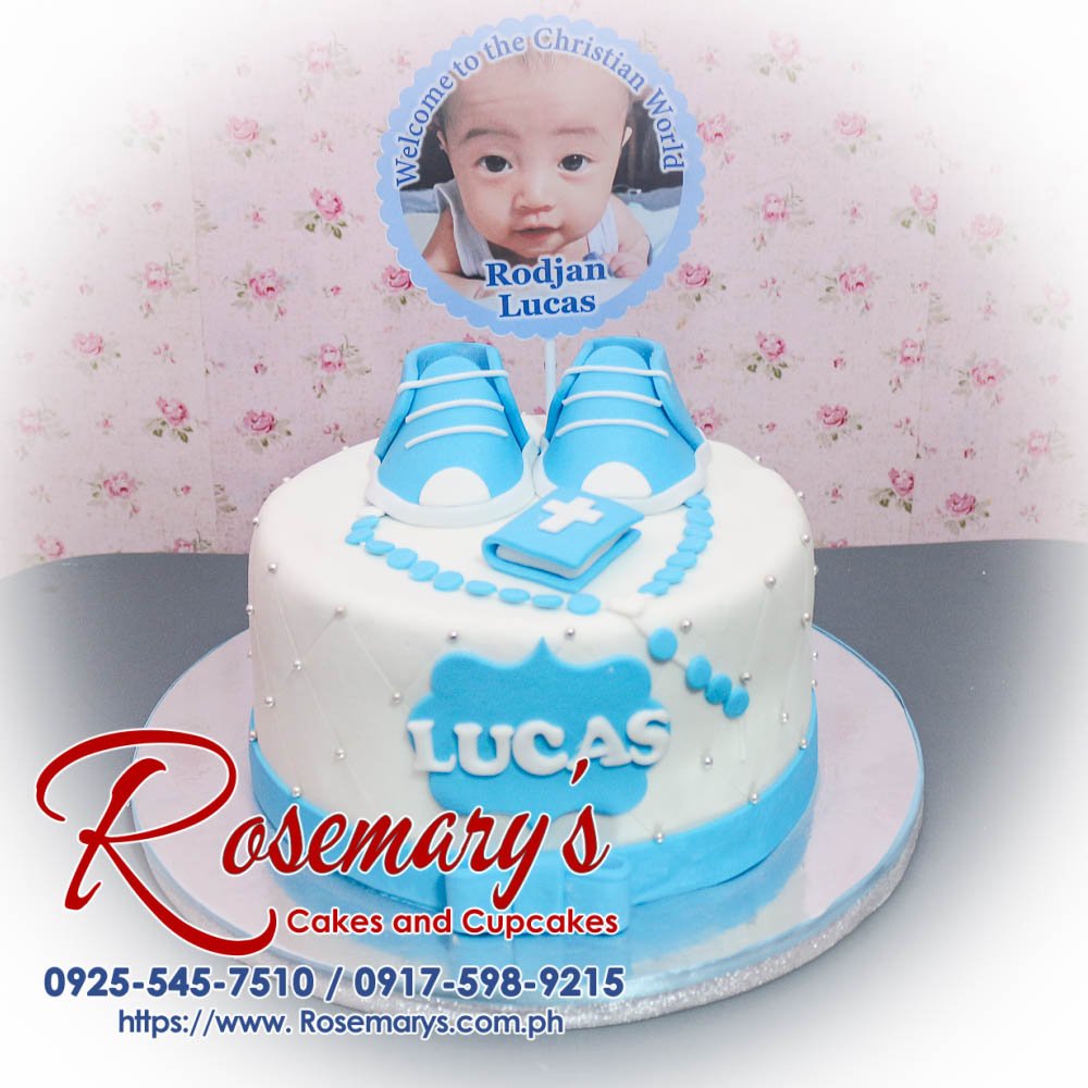 Delicious 1 layer cake adorned with blue baby shoes and ribbons, perfect for a baptismal or christening. Rosemary's Cakes, 0917-598-9215.