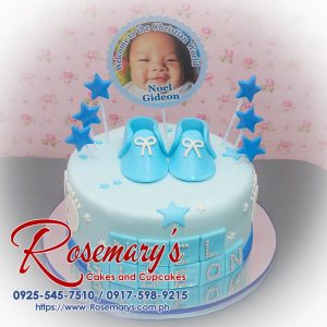 Delicious 1 layer blue themed cake decorated with baby shoes and stars for a baptismal celebration. Rosemary's Cakes, 0917-598-9215.