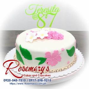 Delicious 1-layer cake adorned with vibrant pink and green 3D printed flowers. Perfect for birthdays or special occasions! Rosemary's Cakes - 0925-545-7510