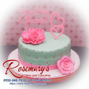 Delicious 1 layer cake adorned with vibrant green and pink 3D printed toppers from Rosemary's Cakes. Contact: 0917-598-9215.
