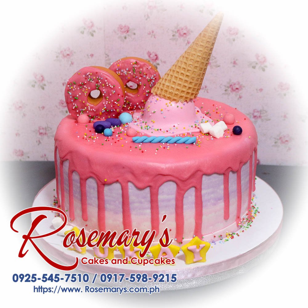 One-layer Candyland themed cake with vibrant pink frosting, colorful sprinkles, a playful donut, and a scoop of ice cream. Order yours from Rosemary's Cakes: 0925-545-7510