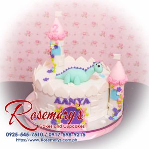 Delicious 1 layer pink castle and dinosaur themed cake with violet accents by Rosemary's Cakes. Contact: 0925-545-7510.