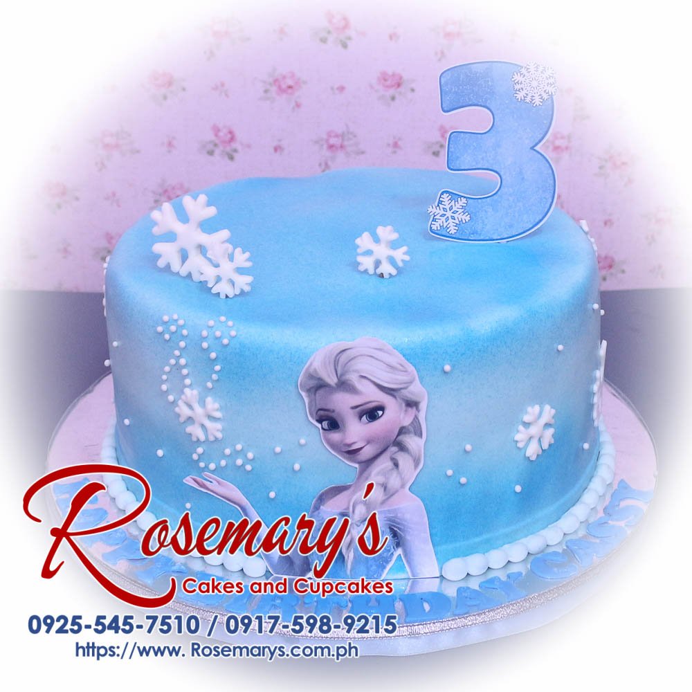 Delectable blue 1-layer cake adorned with Elsa from Frozen. Perfect for a Frozen-themed celebration! By Rosemary's Cakes, call 0925-545-7510.