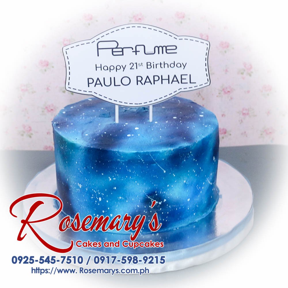 Delicious 1-layer cake with vibrant blue galaxy-themed icing. Celebrate in style! Rosemary's Cakes | 0917-598-9215