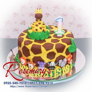 Delicious giraffe-themed cake with brown and yellow accents, perfect for a safari celebration. Rosemary's Cakes, 0917-598-9215.