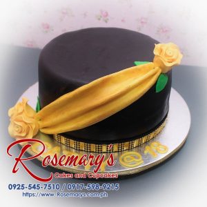 Stunning 1 layer gold and black themed cake adorned with elegant roses. A delicious treat from Rosemary's Cakes. Call 0917-598-9215.