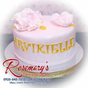 Delectable 1-layer pink and gold cake adorned with delicate flowers. Perfect for any celebration! Order yours from Rosemary's Cakes: 0925-545-7510.