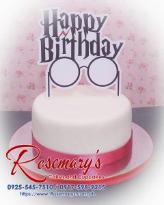 Delicious 1 layer Harry Potter themed cake by Rosemary's Cakes, featuring white frosting and whimsical decor. Contact: 0925-545-7510.