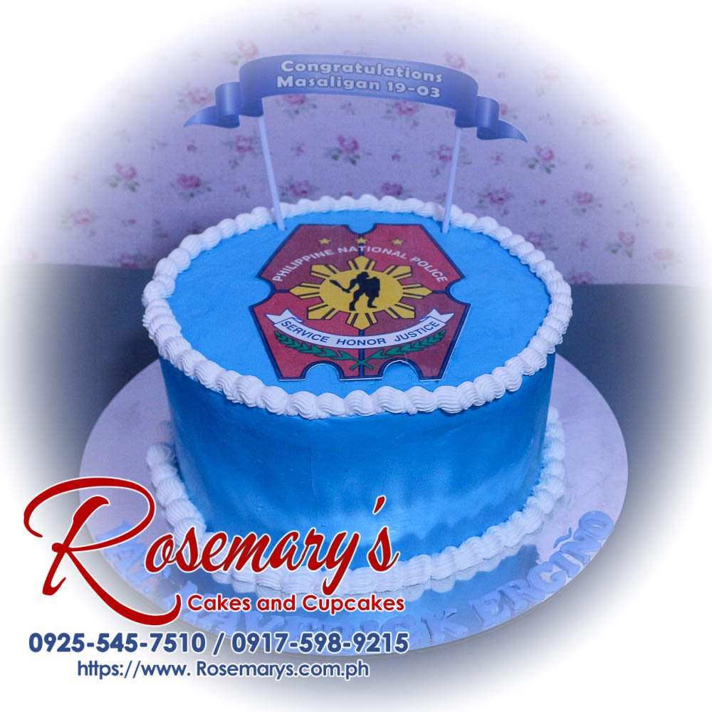 1 Layer Icing Cake for Pat. Maverick Ergiño Delectable one-layer blue icing cake adorned with white details, perfect for PNP celebrations. Order yours from Rosemary's Cakes: 0917-598-9215