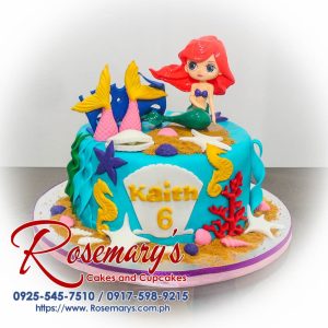 Delicious one-layer Little Mermaid cake with shimmering blue frosting and intricate sea creature decorations. Order yours from Rosemary's Cakes: 0917-598-9215.