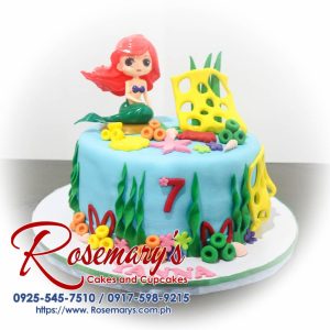 1 layer Little Mermaid themed cake in vibrant blue, adorned with under the sea decorations from Rosemary's Cakes. Contact: 0917-598-9215.