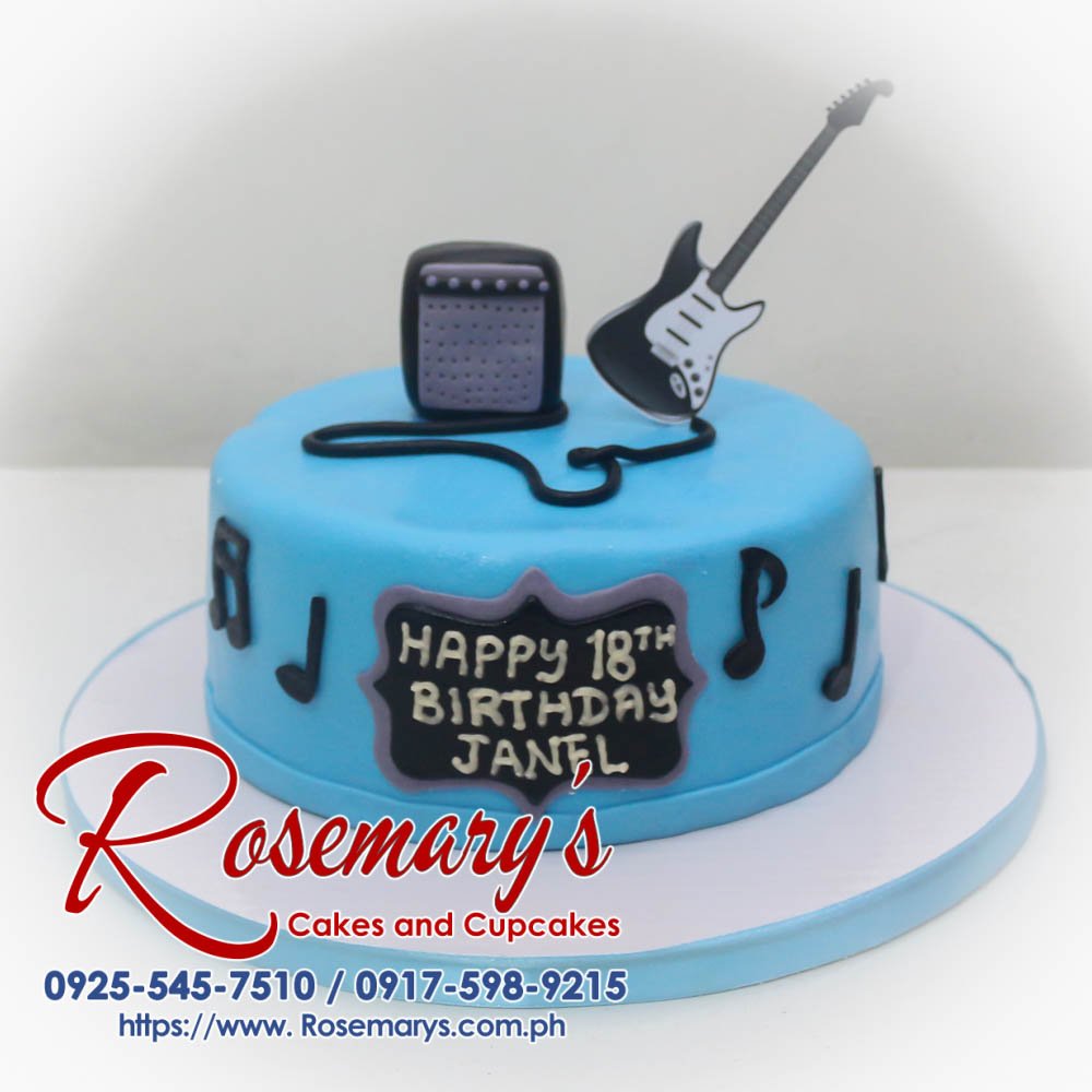 Delicious 1-layer chocolate cake decorated with musical notes and a guitar. Perfect for any music lover! Order yours from Rosemary's Cakes: 0925-545-7510