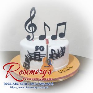 Delicious 1 layer music-themed cake with vibrant decorations, perfect for celebrations. From Rosemary's Cakes. Contact: 0925-545-7510.