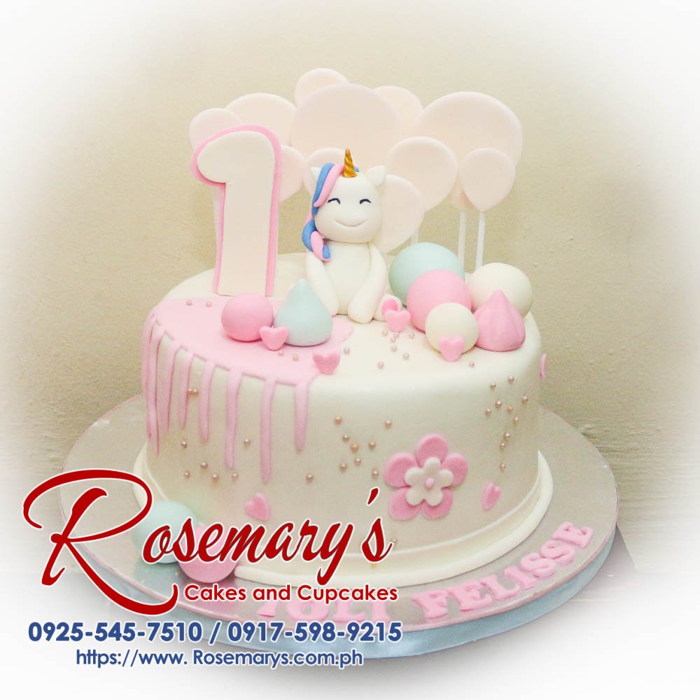 Delicious pastel unicorn cake featuring vibrant colors and whimsical decorations, crafted by Rosemary's Cakes. Call 0925-545-7510.