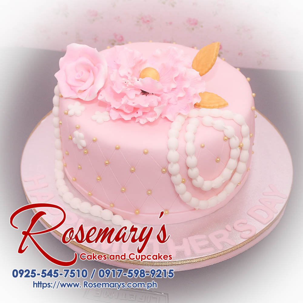 Delicious pink Mother's Day themed cake, beautifully decorated with floral accents. Order from Rosemary's Cakes at 0917-598-9215.