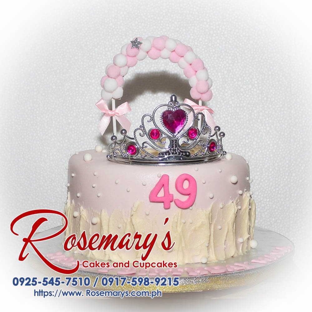 1 Layer Pink Princess Themed Cake Delicate 1 layer pink princess cake adorned with sparkling tiara and cute edible decorations. Order at Rosemary's Cakes: 0917-598-9215.