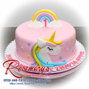 Delicious 1 layer pink unicorn cake with rainbow accents, perfect for celebrations. Order from Rosemary's Cakes: 0917-598-9215.