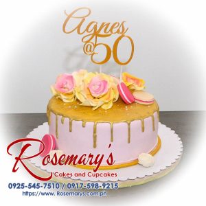 Delicious 1 layer pink and gold macaron themed cake by Rosemary's Cakes, featuring elegant macarons and vibrant colors. Contact 0925-545-7510.