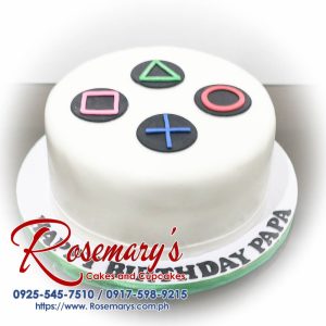 Delicious 1 layer PlayStation themed cake from Rosemary's Cakes, featuring white frosting and playful decorations. Contact: 0925-545-7510.