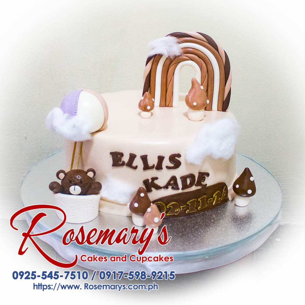 Delicious 1-layer chocolate cake decorated with a cute teddy bear and colorful rainbow accents. Order your custom cake from Rosemary's Cakes! Call 0917-598-9215.