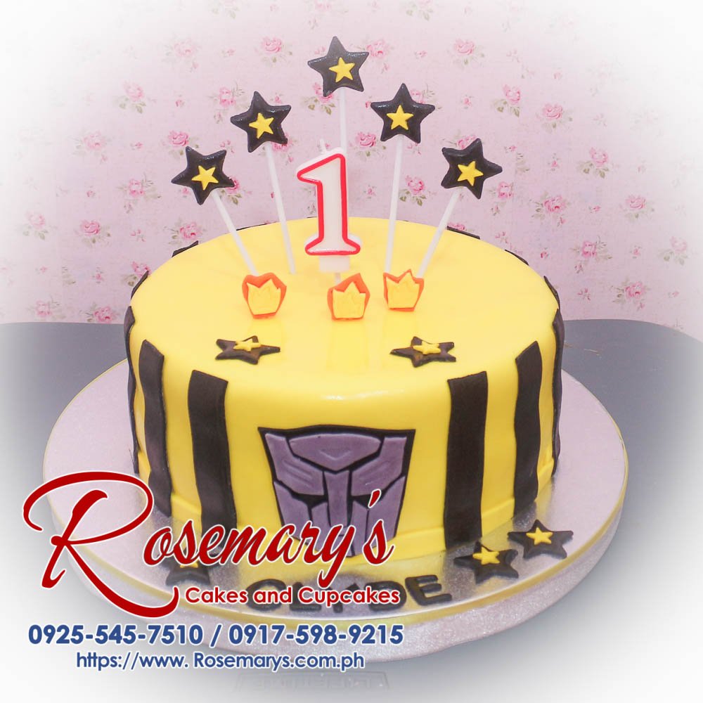 Delicious yellow 1 layer Transformers cake featuring Autobots design, perfect for any themed celebration. Rosemary's Cakes, 0917-598-9215.