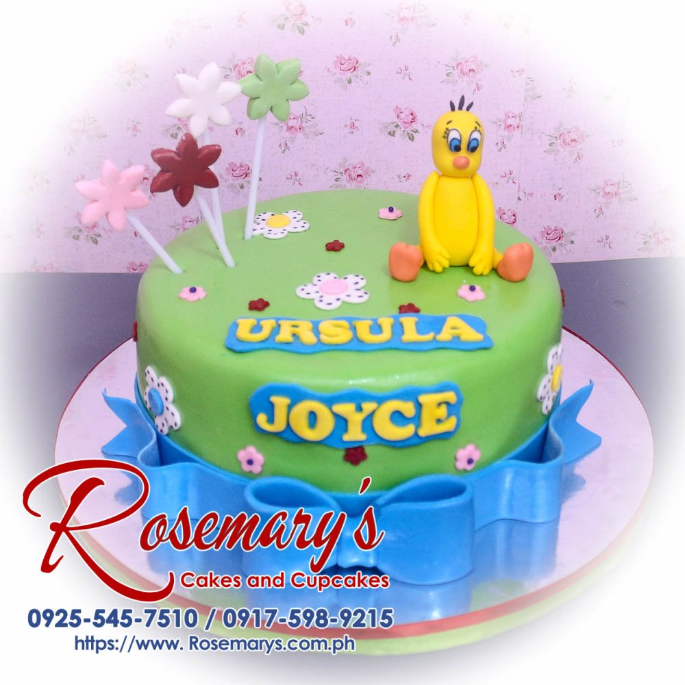 1 Layer Tweety Themed Cake for Ursula Joyce Delicious 1 layer Tweety themed cake with vibrant green frosting and a decorative ribbon. Order from Rosemary's Cakes: 0917-598-9215.