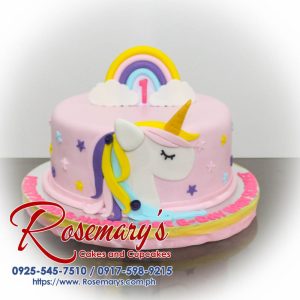 Delicious 1 layer unicorn themed cake in pink with rainbow accents, perfect for celebrations. Order from Rosemary's Cakes at 0925-545-7510.