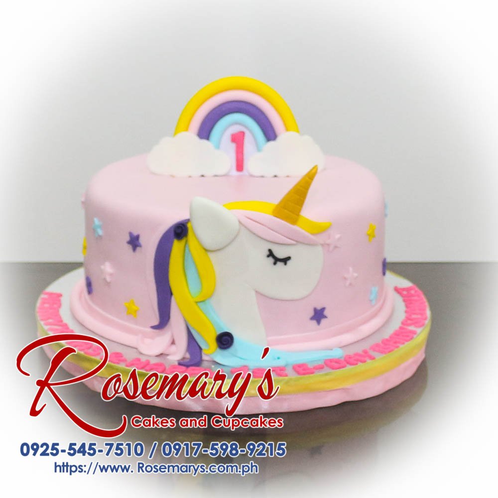 Delicious 1 layer unicorn themed cake in pink with rainbow accents, perfect for celebrations. Order from Rosemary's Cakes at 0925-545-7510.