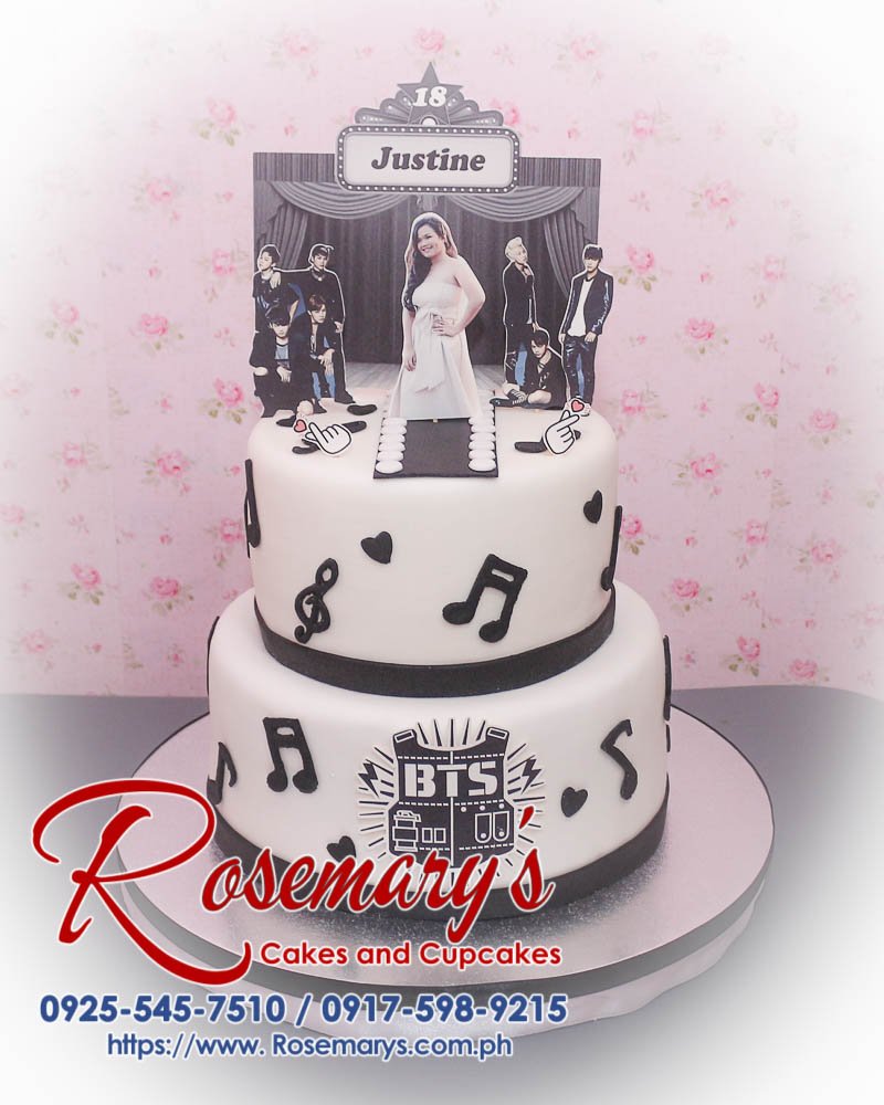 2 Layer BTS Themed Cake for Justine Two-layer BTS themed cake, featuring black and white design, perfect for K-pop fans. Order from Rosemary's Cakes: 0917-598-9215.
