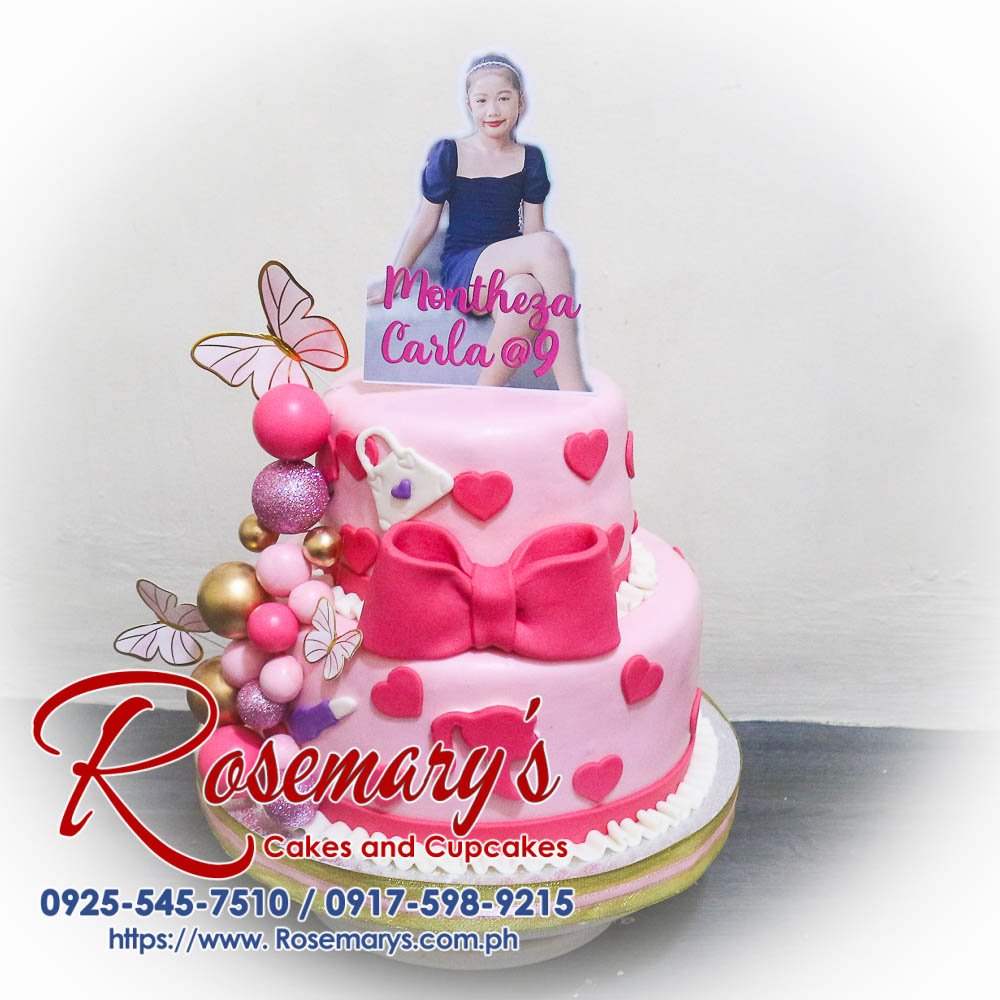 Two-layer Barbie themed cake in pink, perfect for birthdays and celebrations. Delicious and beautifully crafted by Rosemary's Cakes. Contact 0917-598-9215.