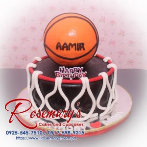 Delicious 2 layer basketball themed cake with black and orange decor, perfect for celebrations. Order from Rosemary's Cakes, 0925-545-7510.