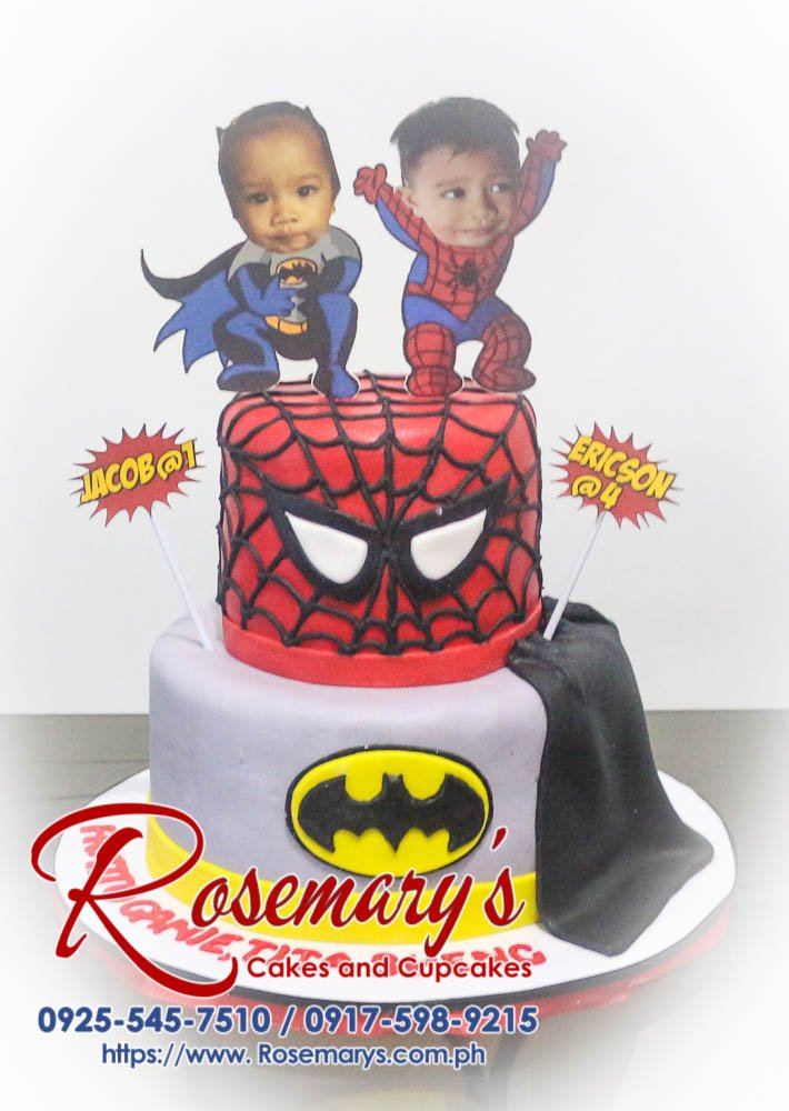 Delicious two-tier black and yellow cake decorated with Batman and Spiderman. Order your custom cakes from Rosemary's Cakes: 0925-545-7510.