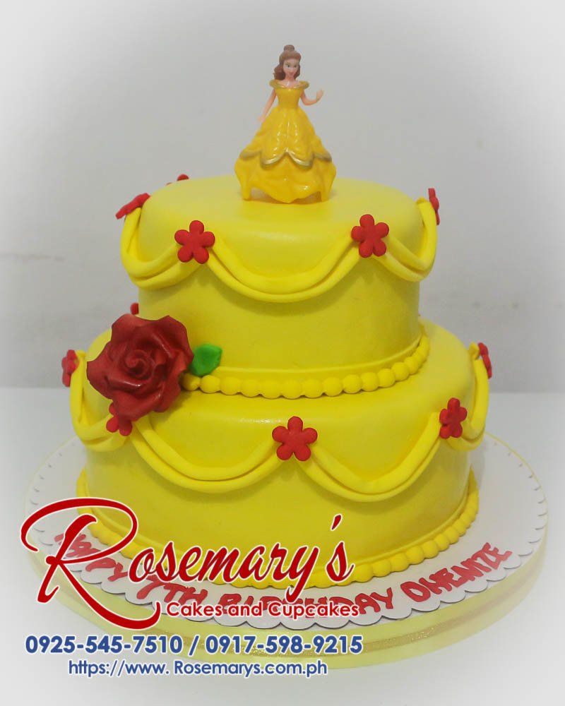 Two-tier yellow cake adorned with Beauty and the Beast-inspired details. Order your custom cake from Rosemary's Cakes: 0925-545-7510.
