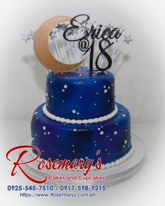 Delicious 2-tier blue and silver cake with intricate silver detailing. Custom cakes for any occasion by Rosemary's Cakes. Call 0925-545-7510.