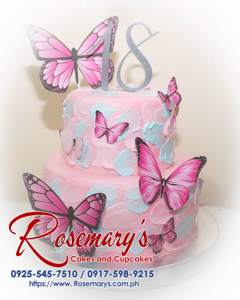 Delicious 2 layer butterflied themed cake in pink, adorned with vibrant butterfly accents. Order from Rosemary's Cakes: 0917-598-9215.