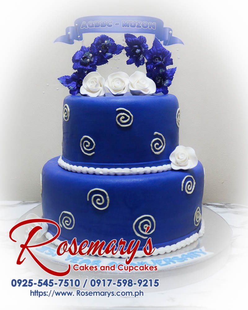 2 Layer Cake for AGBBC – Muzon’s 1st Year Anniversary Two-layer blue anniversary cake from Rosemary's Cakes, featuring intricate designs and delicious flavors. Contact: 0917-598-9215.