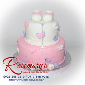 Delicious two-tier pink and white cake decorated with a baptismal theme. Perfect for christenings! Rosemary's Cakes | 0925-545-7510
