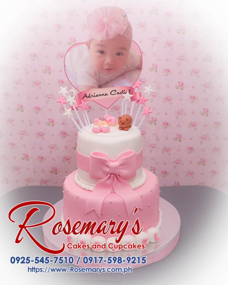 2 Layer Cake for Castiel’s Christening Delicious 2-layer pink cake with elegant ribbon for baptismal celebration by Rosemary's Cakes. Contact: 0925-545-7510.