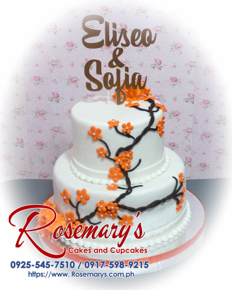 Elegant 2 layer wedding cake with 3D printed accents, showcasing a delicious theme. Order from Rosemary's Cakes: 0917-598-9215.