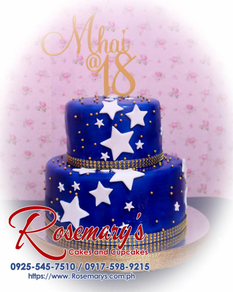 2 Layer Cake for Mhai’s 18th Birthday Delicious 2-layer blue themed cake with 3D printed stars and gold accents, perfect for celebrations. Rosemary's Cakes, 0917-598-9215.