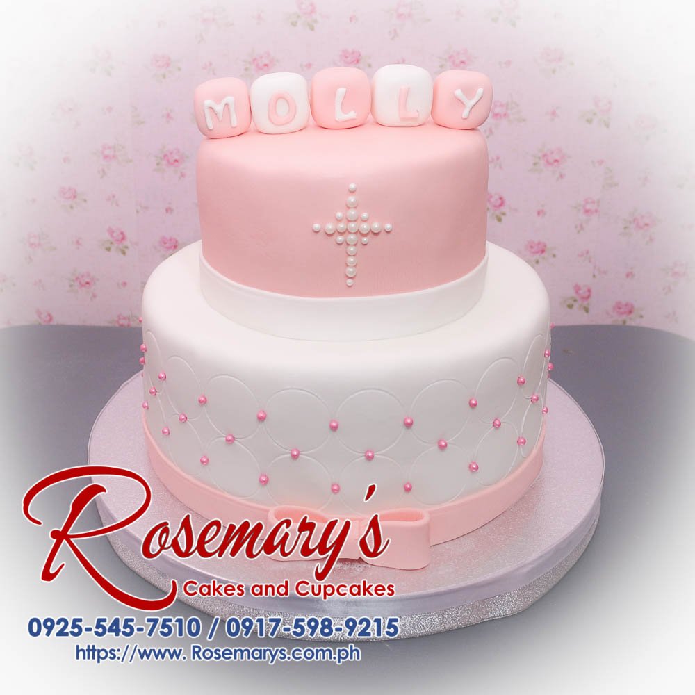 Delicious 2 layer baptismal cake with peach frosting and ribbon accents. Order from Rosemary's Cakes, 0917-598-9215.