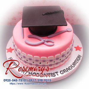 Delicious 2-layer graduation cake with fondant toga, perfect for an orthodontist celebration. From Rosemary's Cakes, call 0917-598-9215.