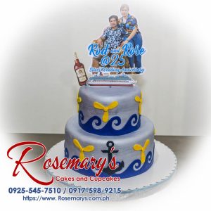 Delicious two-layer chocolate cake adorned with silver dragees and elegant white frosting swirls. Perfect for anniversaries! Order yours from Rosemary's Cakes: 0917-598-9215.