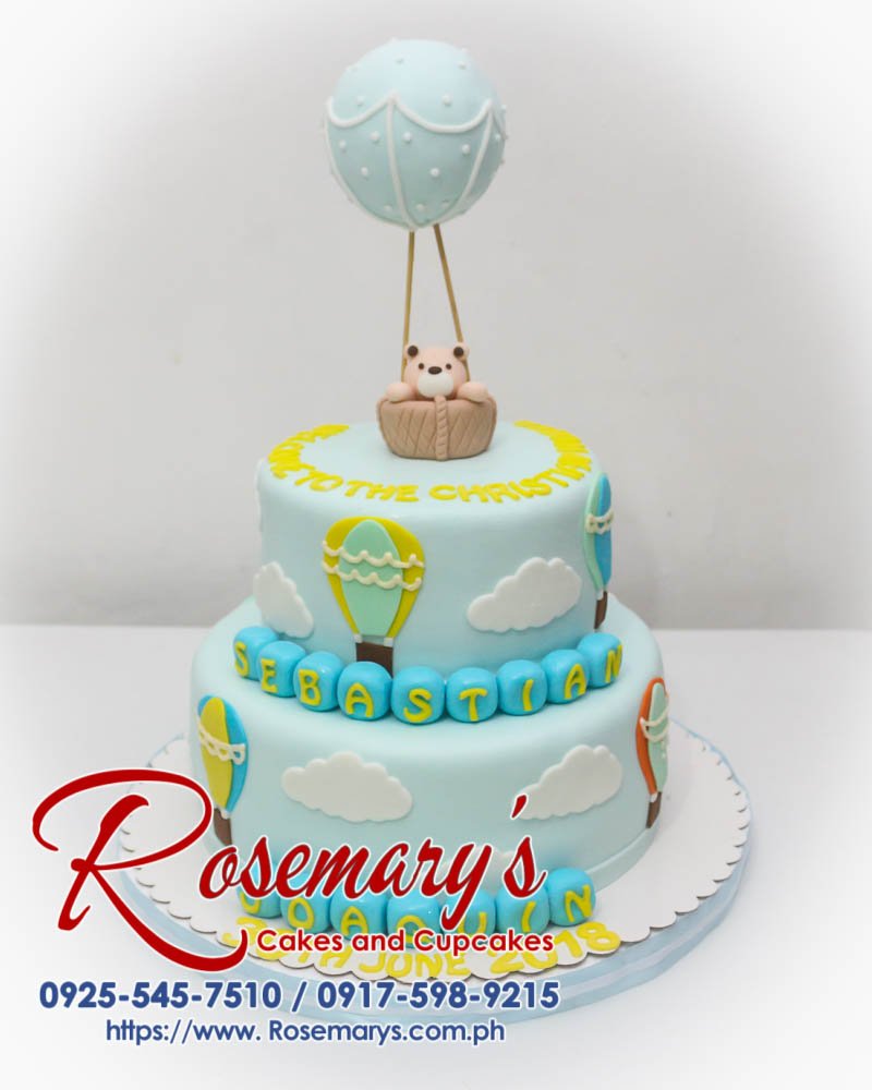 Two-tier christening cake with adorable fondant bear topper. Delicious and perfect for celebrating special occasions. Rosemary's Cakes: 0917-598-9215