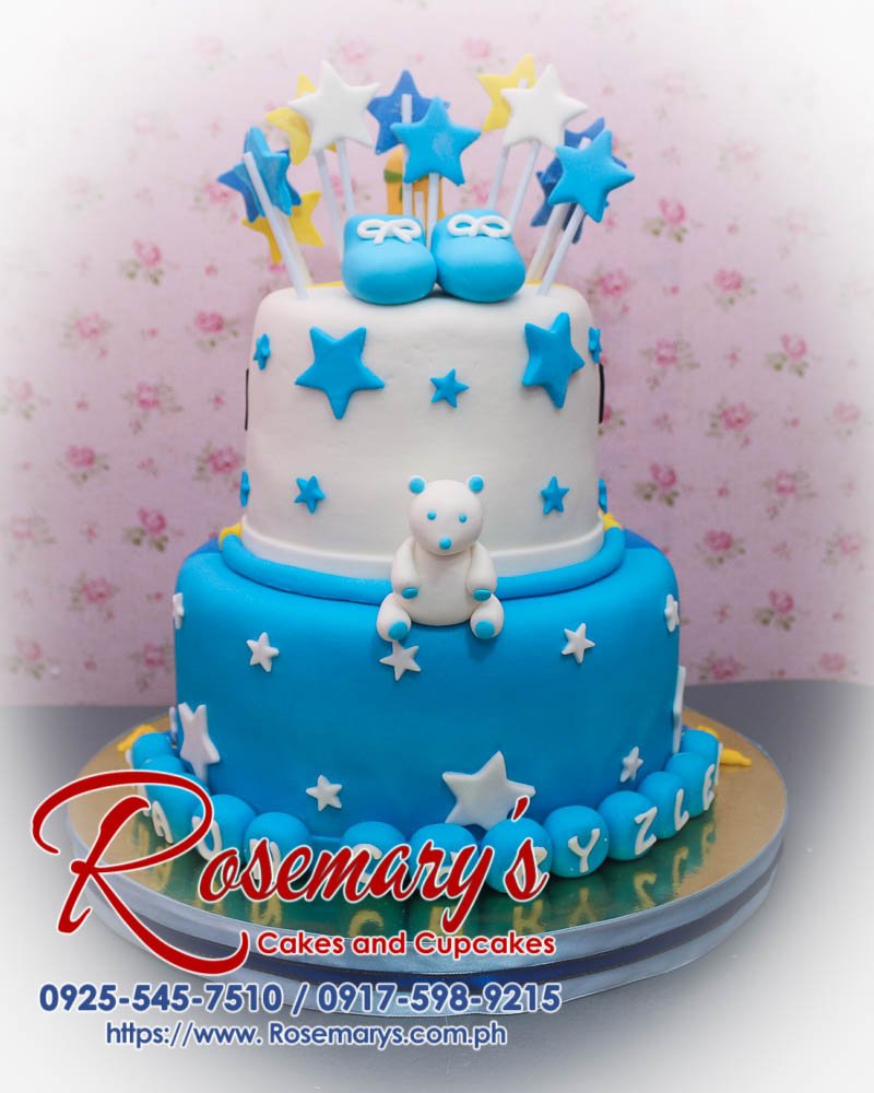 Delicious 2 layer baptismal cake decorated with blue fondant shoes, stars, and a teddy bear. From Rosemary's Cakes, call 0925-545-7510.