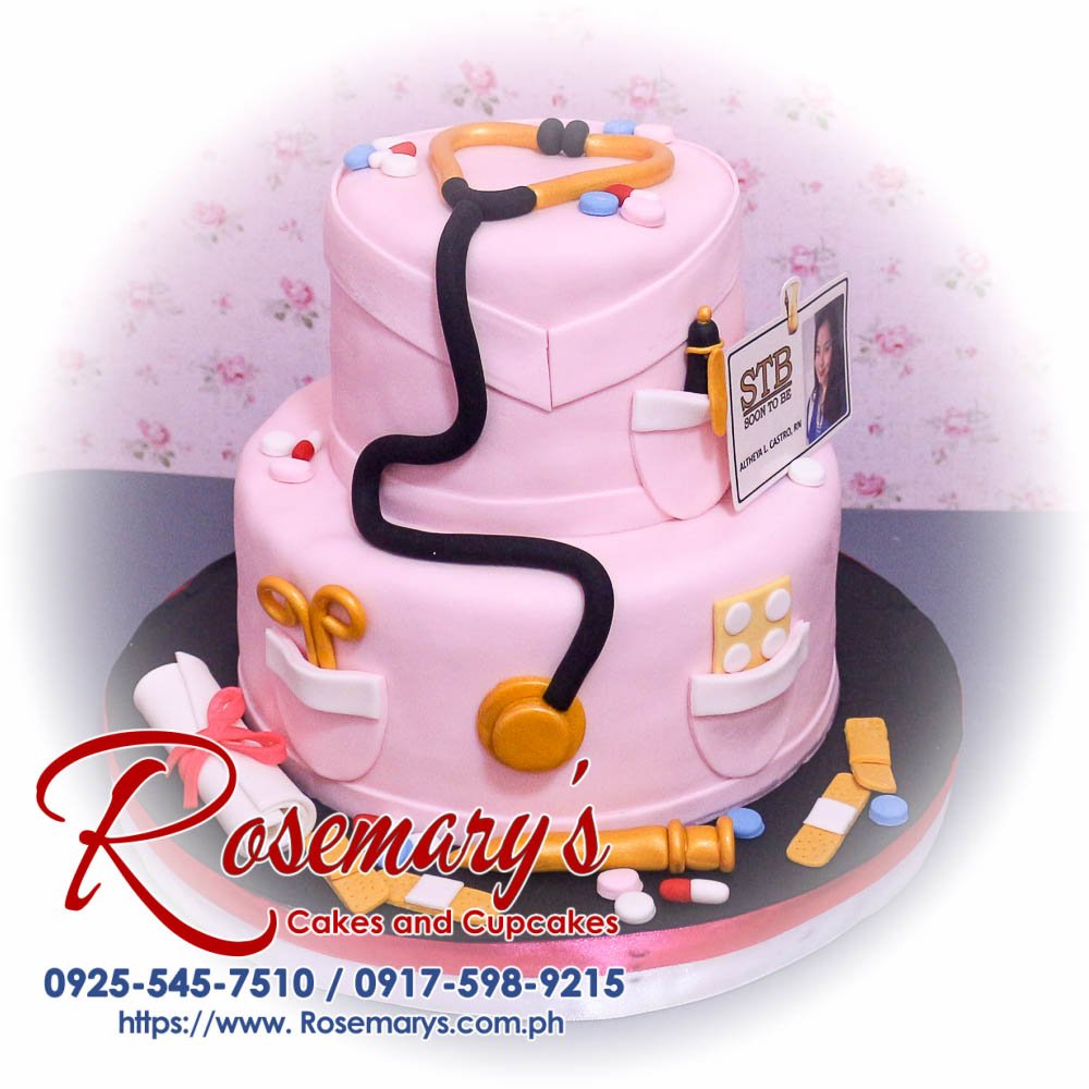Delicious pink 2 layer cake themed for a nurse, adorned with intricate decorations. Order from Rosemary's Cakes at 0925-545-7510.