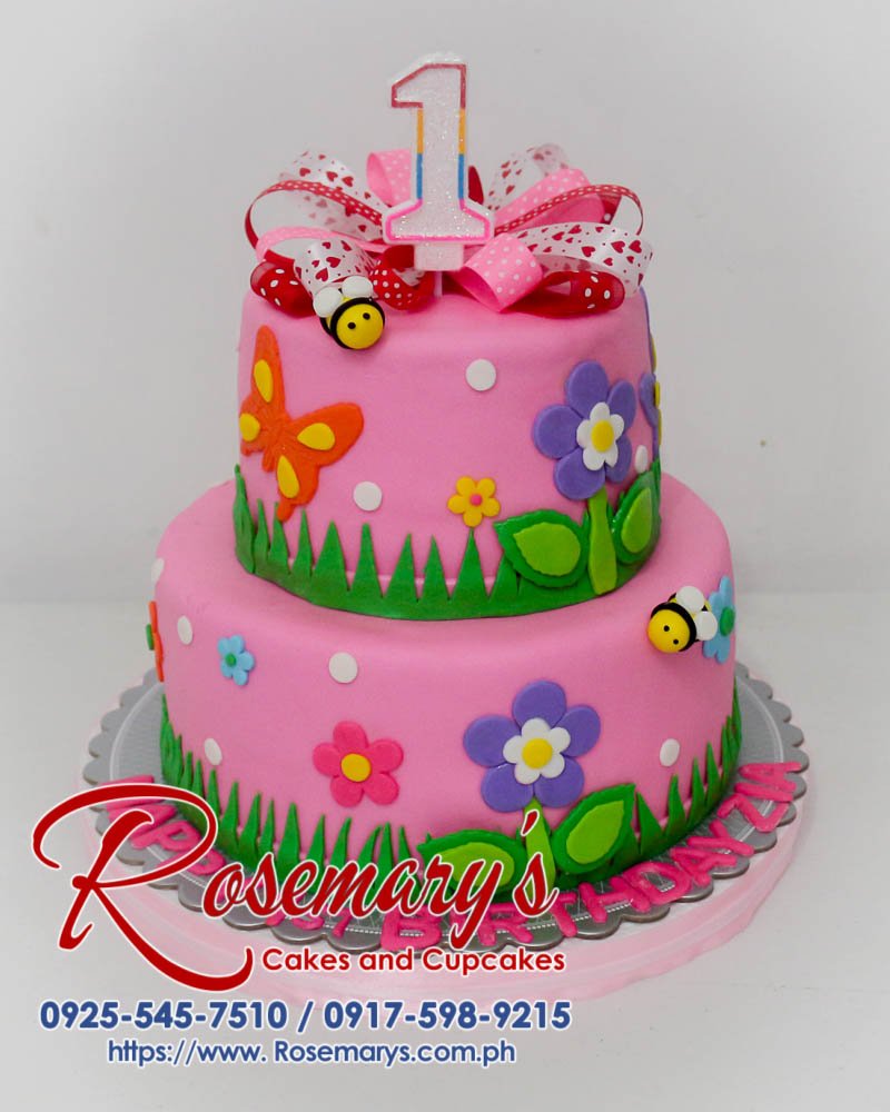 Delicious 2-layer pink bee-themed cake. Perfect for birthdays and celebrations! Order yours from Rosemary's Cakes: 0925-545-7510.