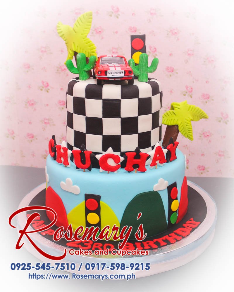 Delicious 2-layer Cars themed cake in black, white, and red. Perfect for celebrations! From Rosemary's Cakes, call 0917-598-9215.
