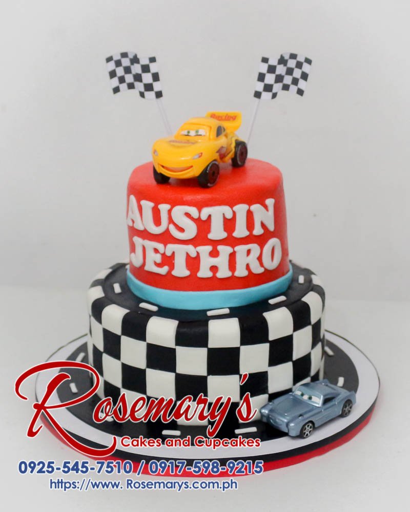 2 Layer Cars Themed Cake for Austin Jethro Delicious two-tier black and red cake decorated with a car theme. Perfect for any racing fan! Order yours from Rosemary's Cakes: 0925-545-7510