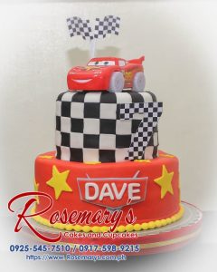 Delicious two-tier car themed cake with red and yellow accents. Perfect for birthdays! Order yours from Rosemary's Cakes: 0925-545-7510.